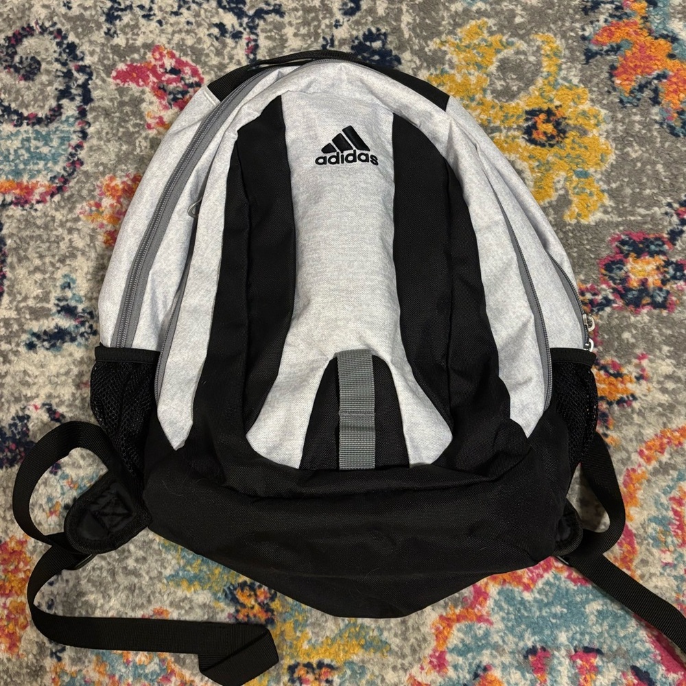 Adidas grey and black backpack